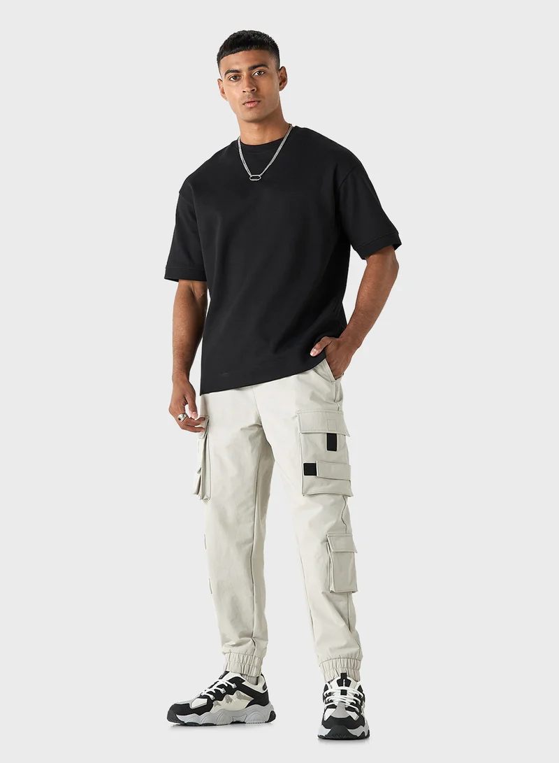 اس بي كاركترز Solid Relaxed Fit Cargo Pants with Drawstring Clos
