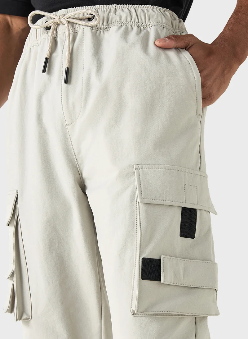 اس بي كاركترز Solid Relaxed Fit Cargo Pants with Drawstring Clos