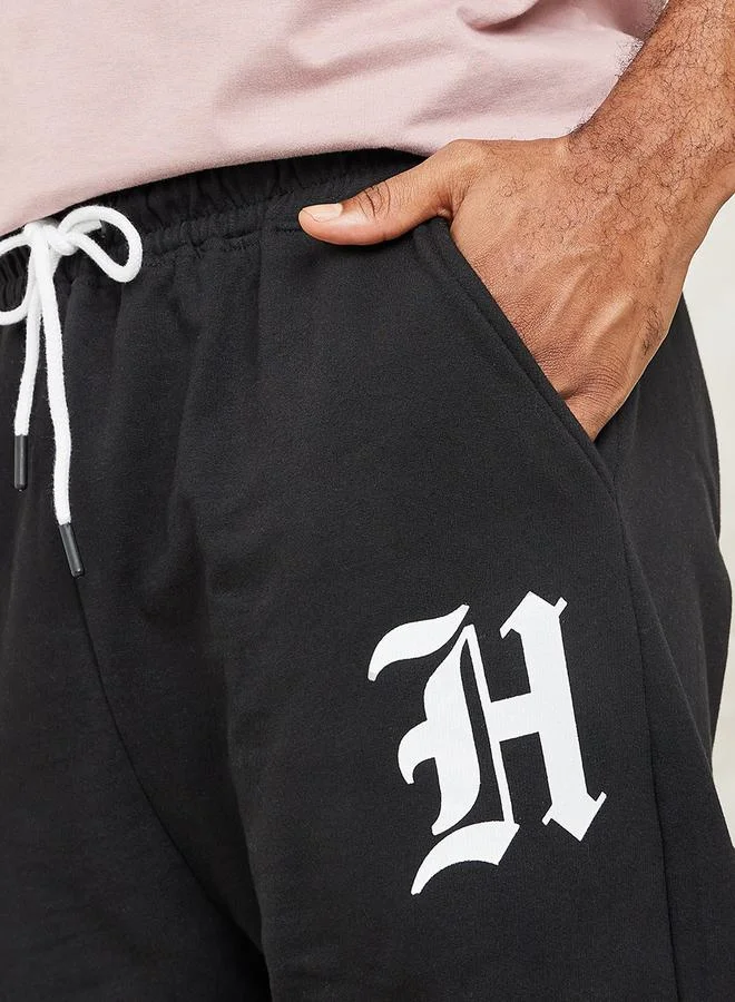 Styli Placement Print Oversized Jogger with Drawcord Detail