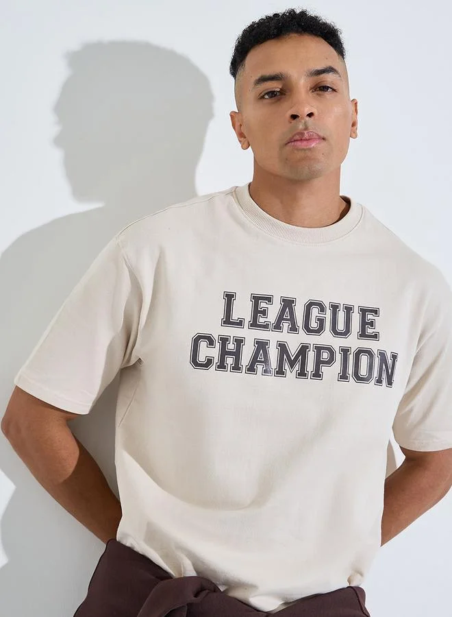 Styli Beige Slogan Print Crew Neck Oversized T-Shirt