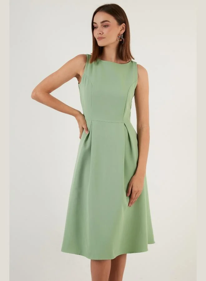 ليلا فستان ميدي بكسرات بقصة عادية بياقة دائرية وجيب للنساء