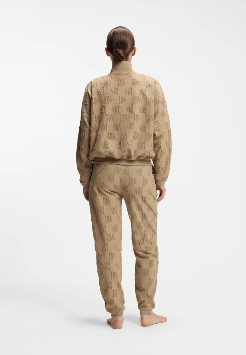 هوجو Cotton-blend tracksuit bottoms with all-over logo pattern