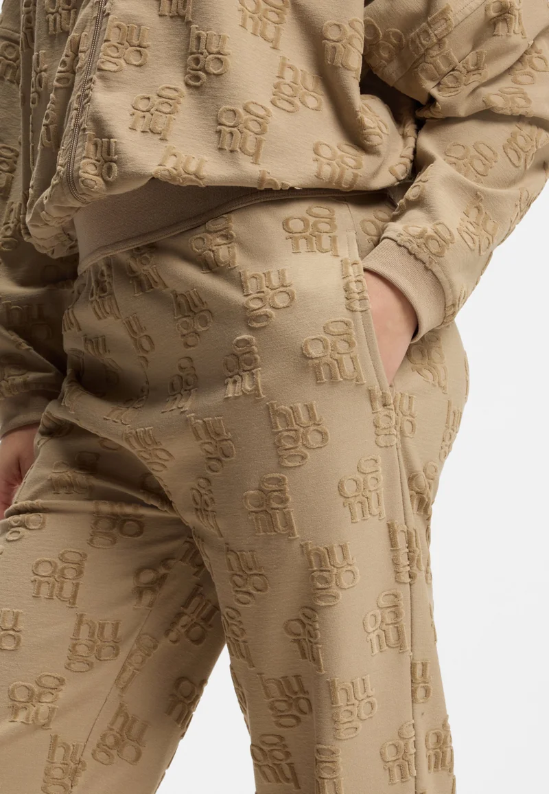 HUGO Light Brown Cotton-blend tracksuit bottoms with all-over logo pattern for Women | Best Price UAE