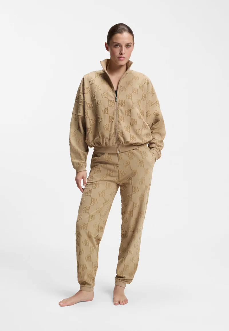 HUGO Light Brown Cotton-blend tracksuit bottoms with all-over logo pattern for Women | Best Price UAE