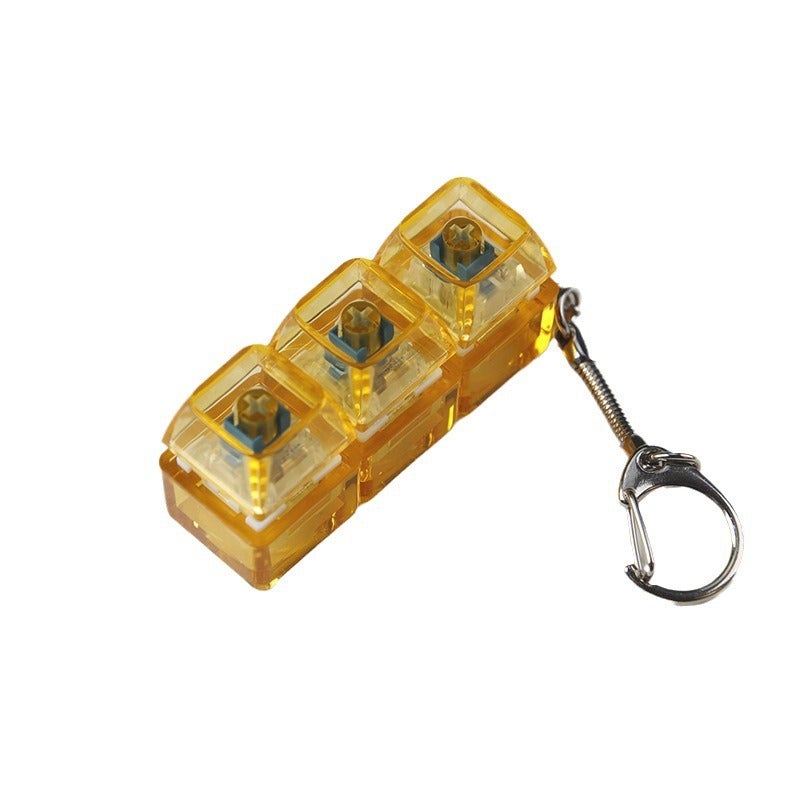 PC fully transparent material decompression shaft tester press sound crisp 2 holes 3 holes 4 holes key chain with light transparent cap 3-hole Orange transparent with light * 1 
