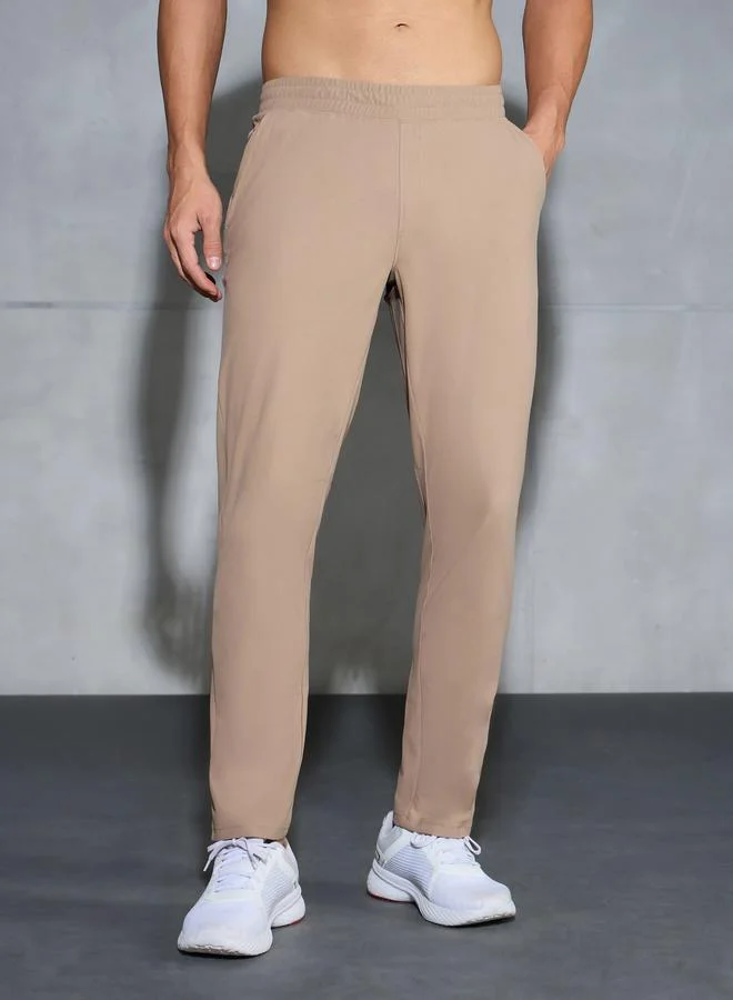 تكنوسبورت Technosport Men Khaki Solid Relaxed Fit Track Pants