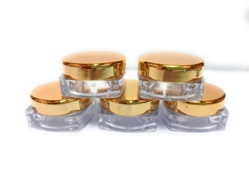 Shree Mahalaxmi 5 gram Gold Cap and Transparent Square Base Empty Cosmetic Jars Pack of 24 - Image 1