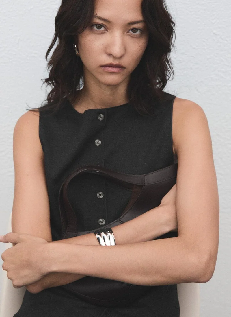 MANGO Round neck buttoned waistcoat