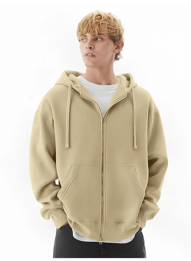 مانياك سويت شيرت رجالي بقلنسوة بسحاب كامل بلون بيج بقصة فضفاضة من تيري فرنسي