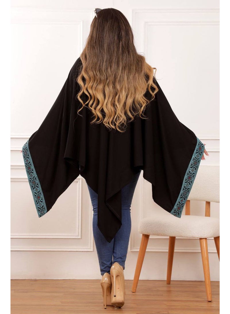 ليالي الجلابية بونشو "ألوان الأرض" من ليالي الجلابية – تصميم أنيق بتطريز هندسي باللون السماوي وزخارف فريدة، لإطلالة عصرية ومريحة - Image 2