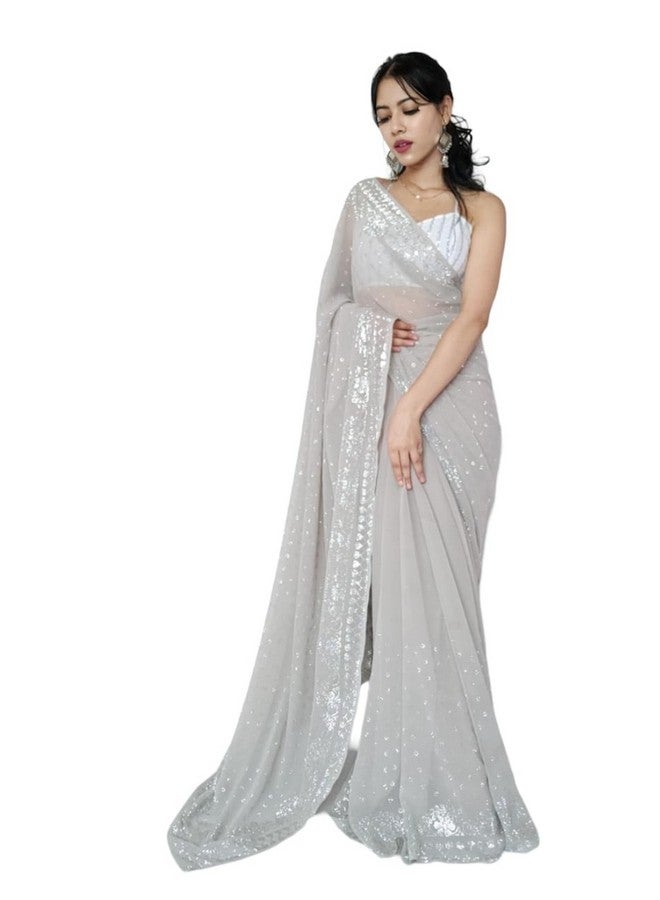 Timeless Elegance: Exquisite Women's Georgette Saree Adorned with a Luxurious Silver Siroski Floral Border & Unstitched White Sequin Blouse for a Glamorous Look - Image 1