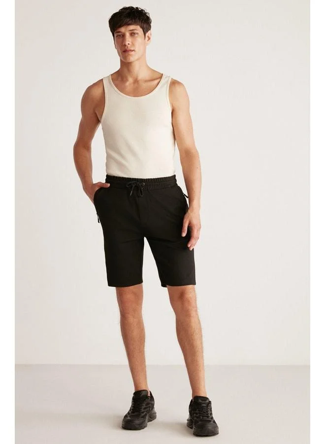 GRIMELANGE Camillo Men's Pocket Zip Waist Elastic Black Shorts & Bermuda.