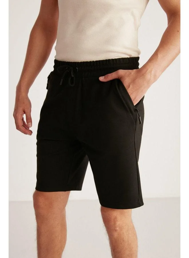 GRIMELANGE Camillo Men's Pocket Zip Waist Elastic Black Shorts & Bermuda.