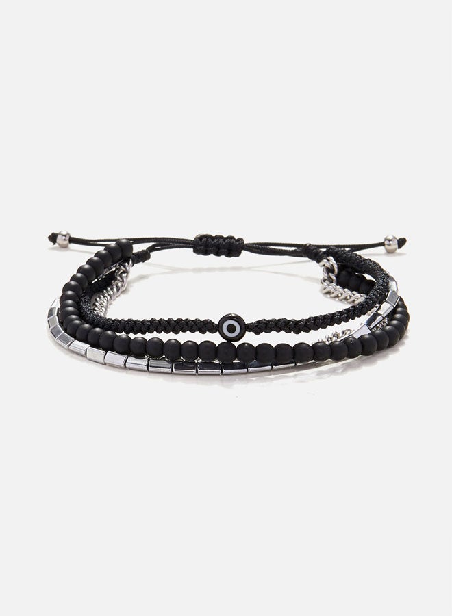 CHRYSOSTOMOS Handmade Adjustable Beaded Multi-Line Bracelet with Onyx Stones, Triangular Hematite Tube and Black Glass Eye - Image 1
