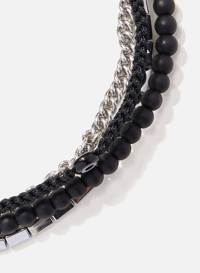 CHRYSOSTOMOS Handmade Adjustable Beaded Multi-Line Bracelet with Onyx Stones, Triangular Hematite Tube and Black Glass Eye - Image 2