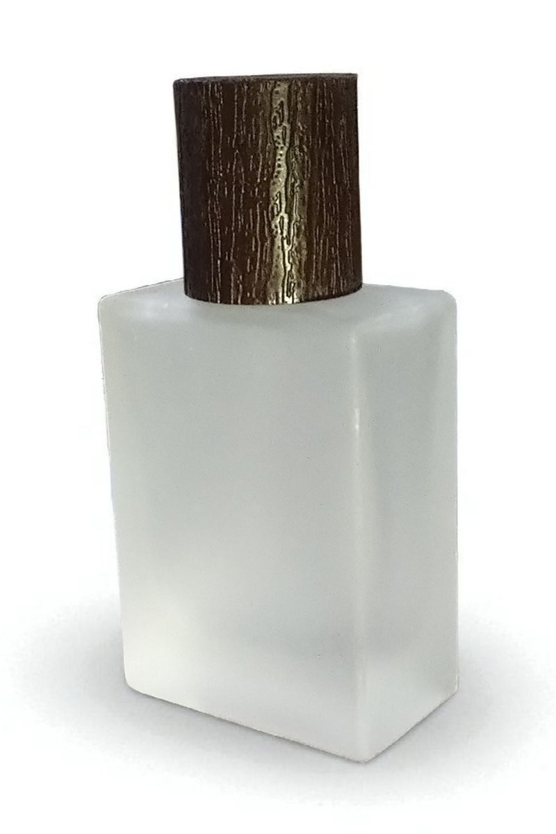 2 pieces of empty refillable spray perfume bottles so you can fill your favorite perfume and carry it with you at any time. The color of the glass is not transparent and frosty. The bottle cap is in the shape of a piece of wood. The color of the cap is brown and the other bottle is black. It is ideal in size and easy to carry and move. Put it in your pocket, bag, or even in a small evening bag for wives. It is a bottle designed for the bag. It does not take up space or room due to its suitable size. It is useful for travel, work, trips, wedding parties, or holidays. The bottle capacity is 30 ml. - Image 5