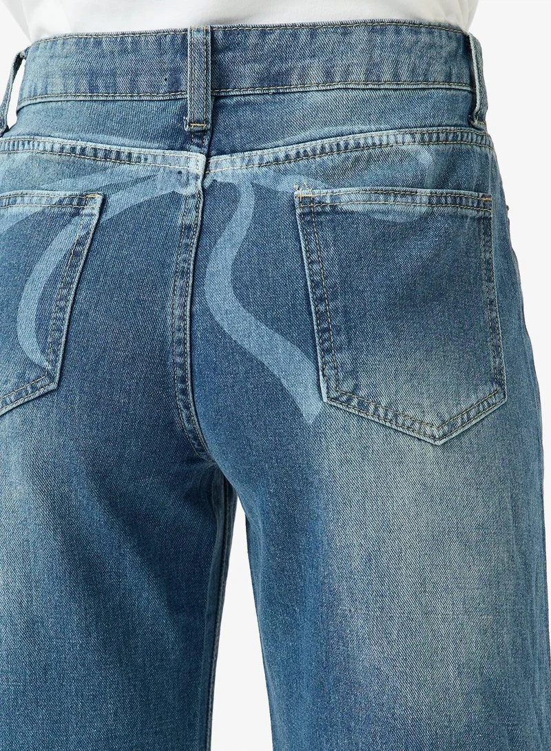 Ginger Low Rise Wide Leg Jeans