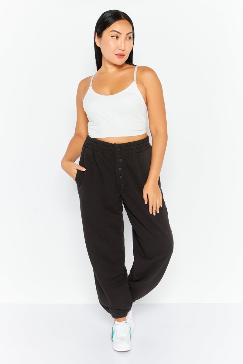 PUMA Women Sportswear Fit Brand Logo Training Sweatpants, Black - Image 4