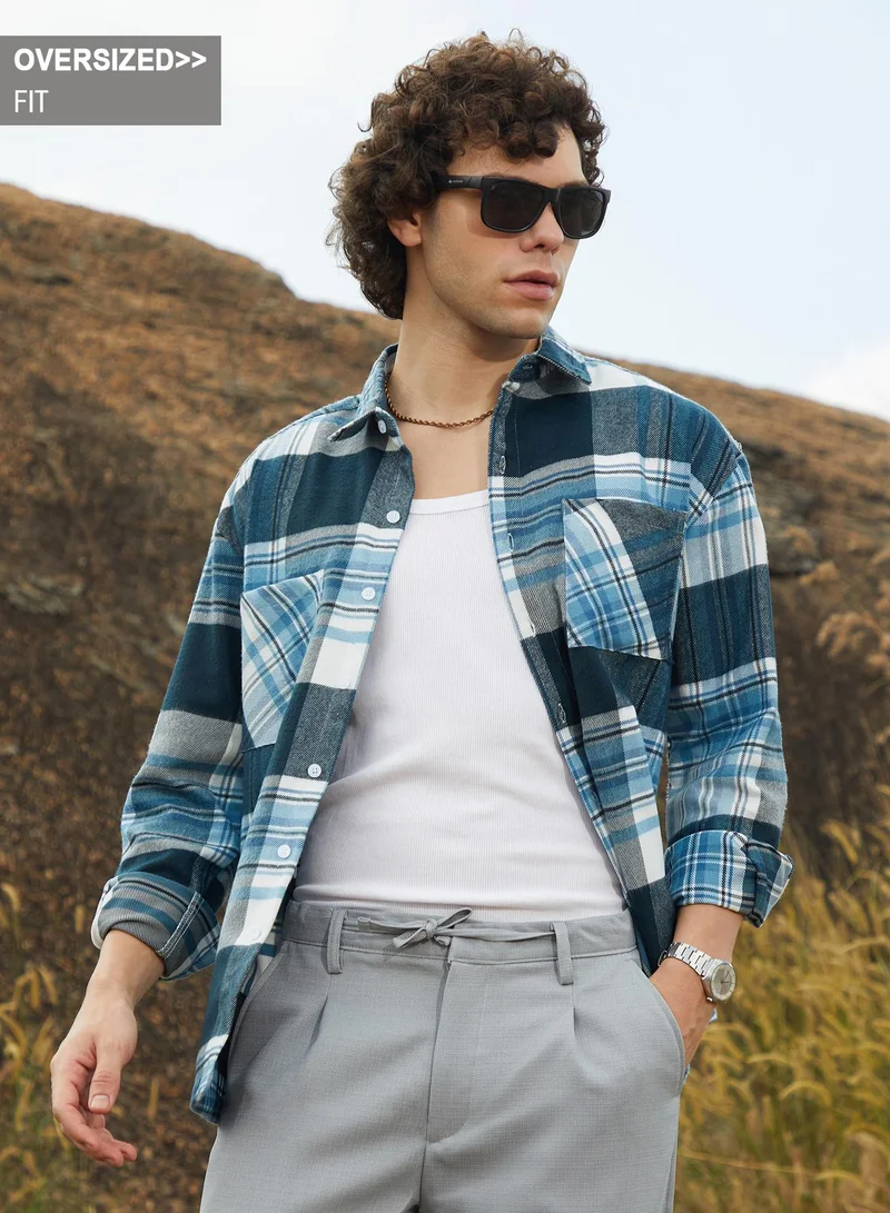Campus Sutra Campus Sutra Men's Prussian Blue Tartan Utility Shacket For Casual Wear | Spread Collar | Long Cuffed Sleeves | Button Closure | Overshirt/Shacket Crafted With Comfort Fit For Everyday Wear