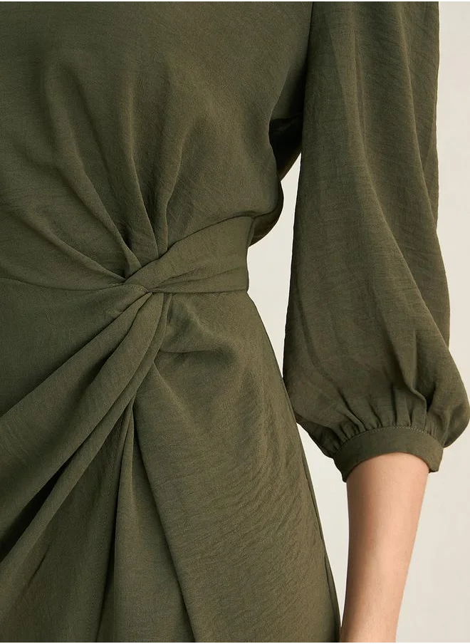 Femmella Knot Detail Wrap Front Knee Length Dress by Styli