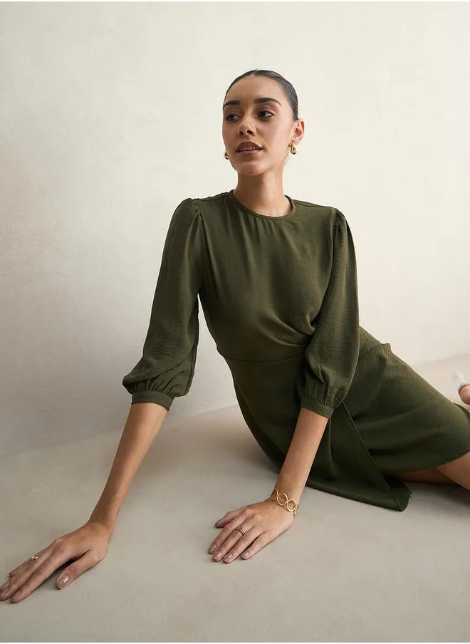 Femmella Knot Detail Wrap Front Knee Length Dress by Styli