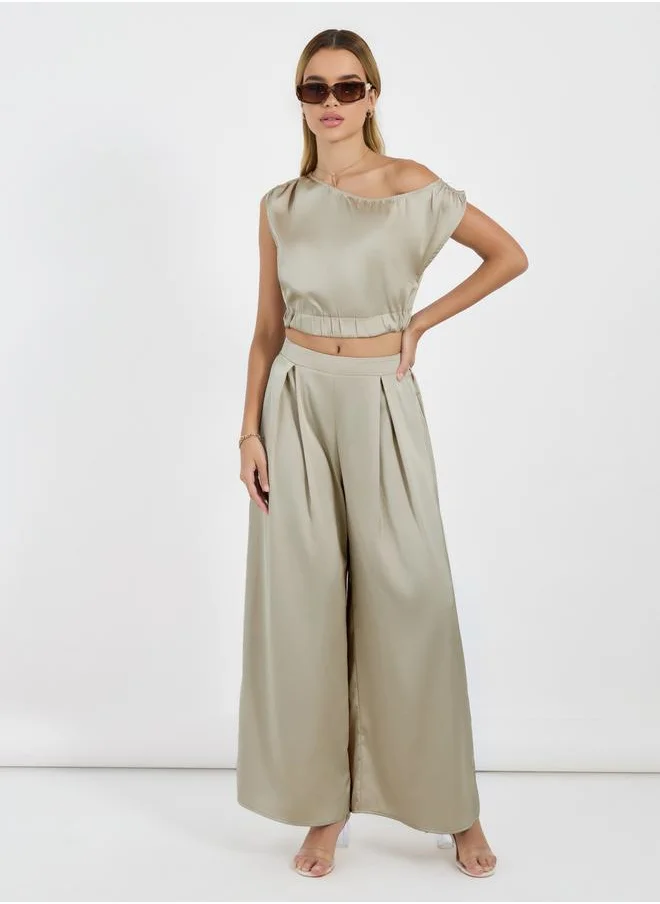 Styli Satin Asymmetric Neck Sleeveless Top & Pleated Wide Leg Pants Co-Ords Set