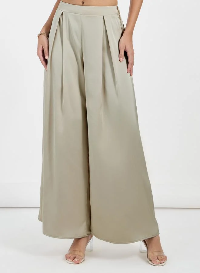 Styli Satin Asymmetric Neck Sleeveless Top & Pleated Wide Leg Pants Co-Ords Set