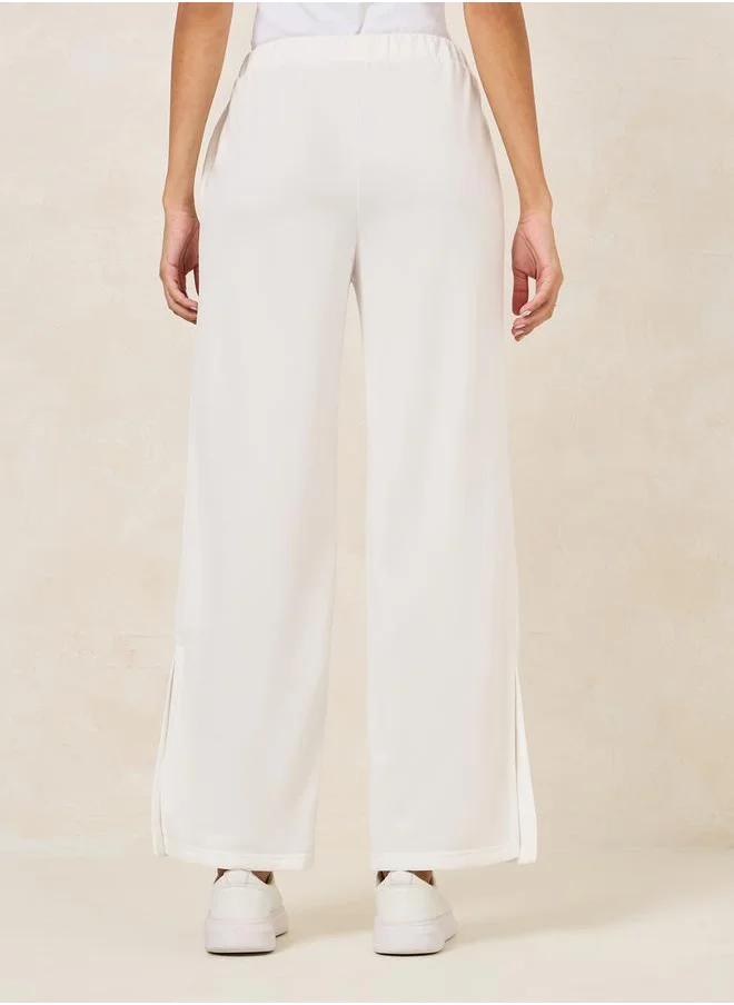 Styli Wide Leg Joggers with Side Seam Slit