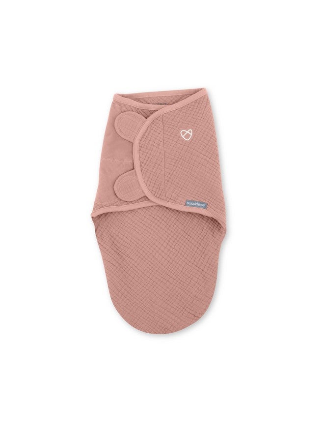 Ingenuity by SwaddleMe Original Muslin Baby Swaddle, 100% Cotton, Improves Sleep & Calms Startle Reflex, 0-3 Months, 1.0 TOG, 7-14 Pounds - Blush - Image 1
