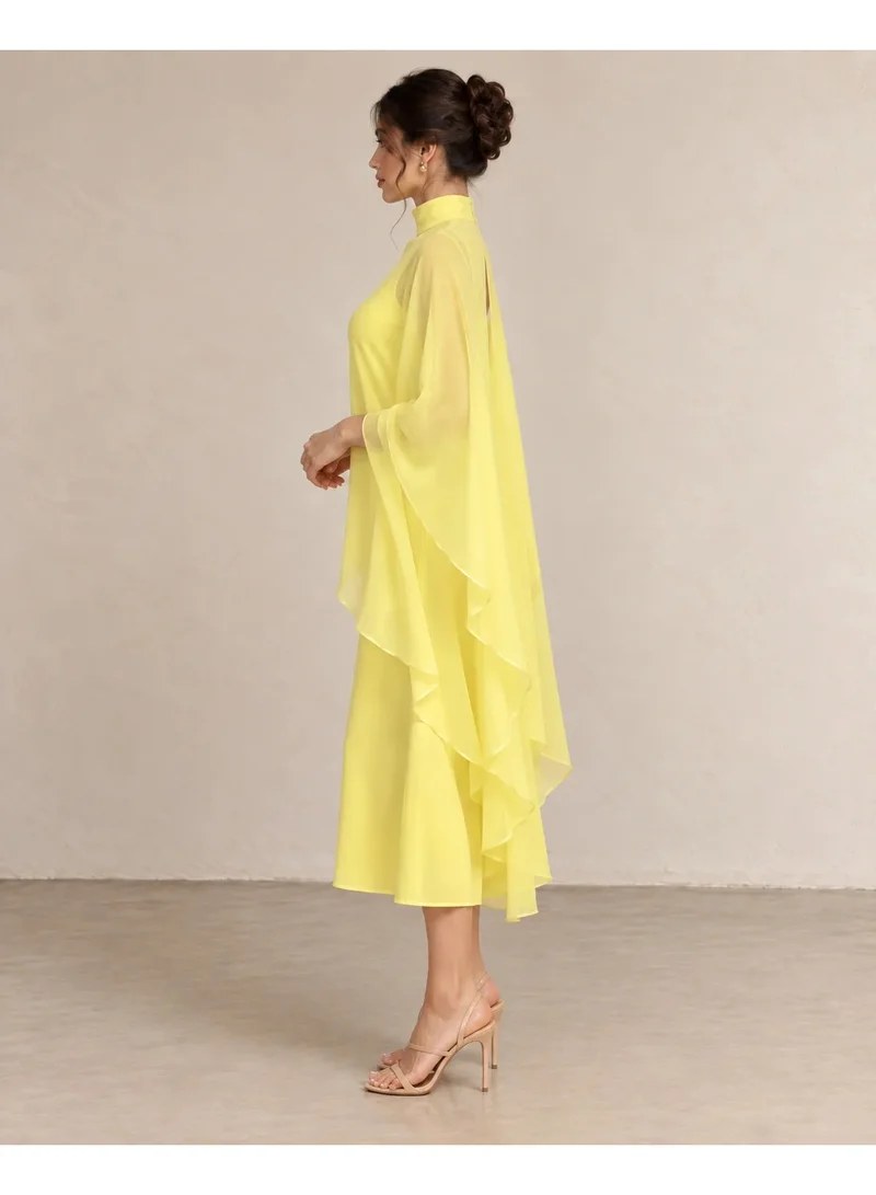 2Trendy Women's Yellow Maxi Dress with High Neck, Sheer Cape Sleeves and Open Back