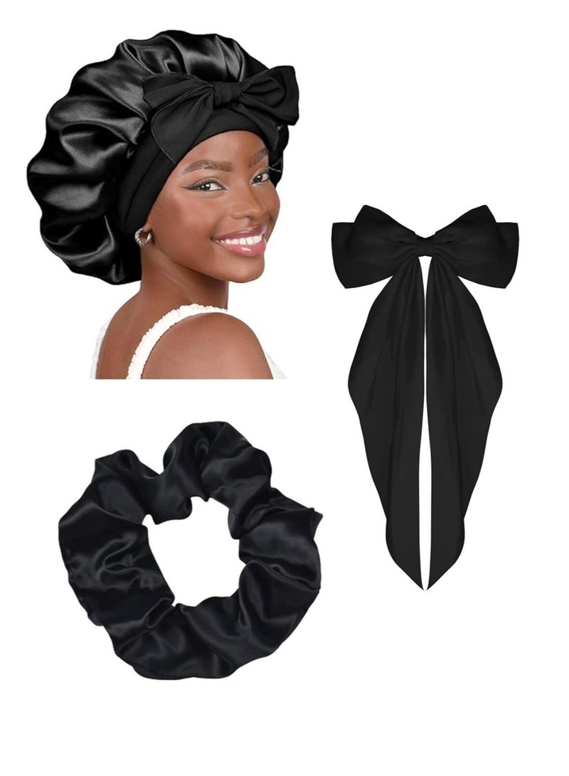 أناقة الساتان الليلية قطعة من الفخامة والنعومة طقم بونيه ساتان أنيق للنساء بونيه ساتان من طبقة واحدة للشعر المجعد مع ربطات شعر ساتان ومشابك فيونكة طويلة باللون الاسود - Image 1