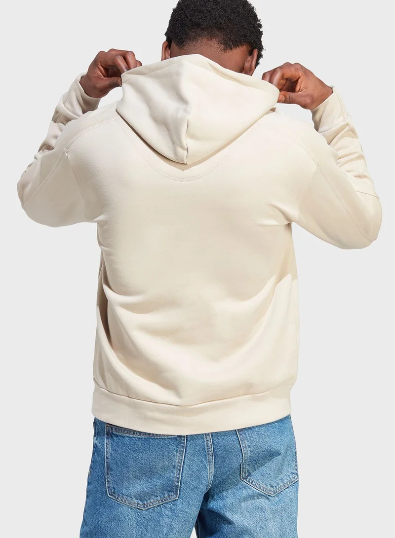 adidas هودي لونج من نسيج الفليس