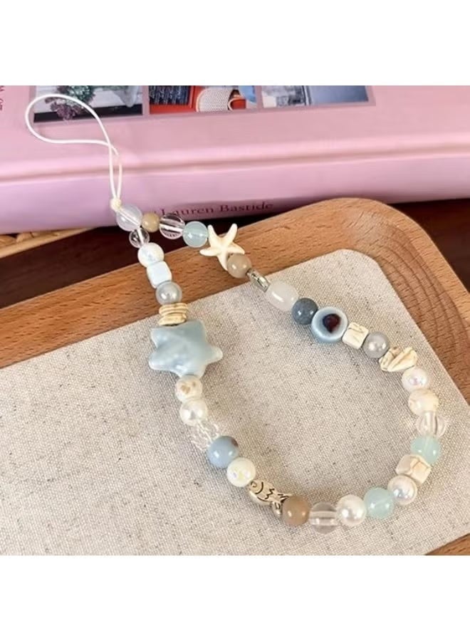 اتش بي ار تي سلسلة هاتف مطرزة يدوياً، حبل معصم بنجمة وأصداف بتصميم لطيف، إكسسوارات جوال من خرز الرزن للنساء والبنات، حزام هاتف أنيق للكاميرا والحقيبة (أزرق المحيط) - Image 2
