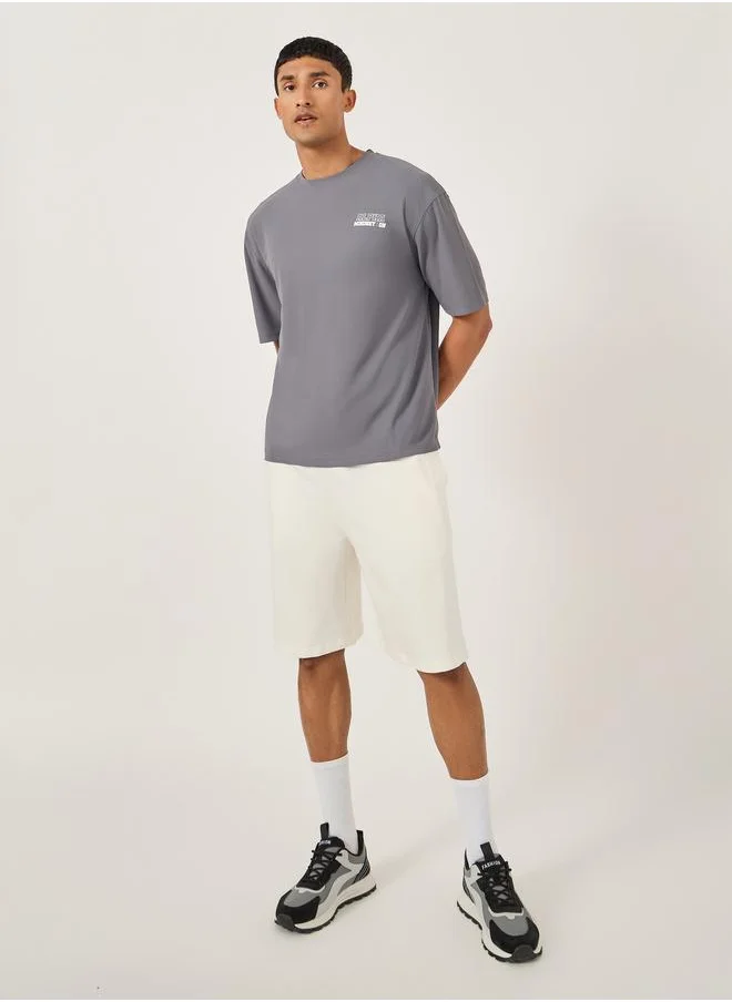ستايلي Styli Oversized Solid Shorts with Drawstring