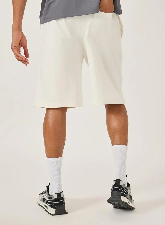 Styli Styli Oversized Solid Shorts with Drawstring
