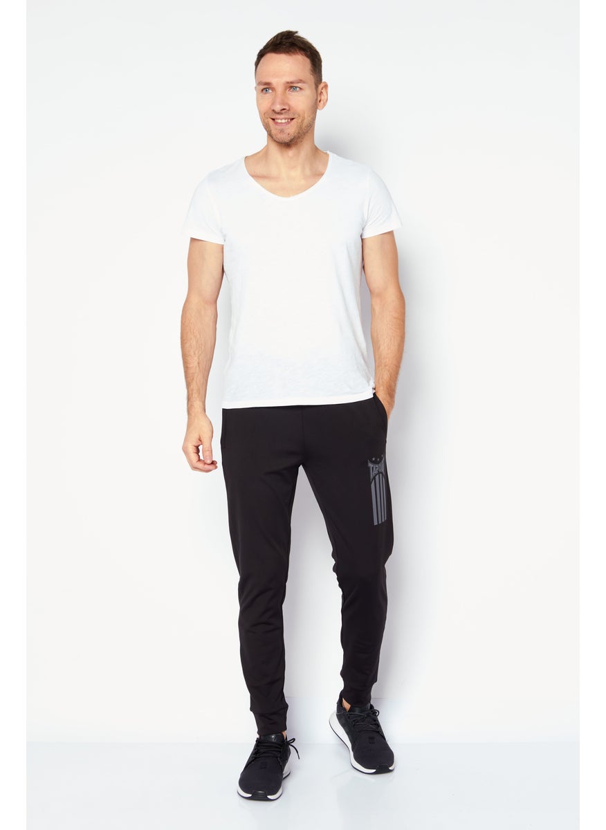 TapouT - Men Regular Fit Brand Logo Jogger Pants, Black - Image 1