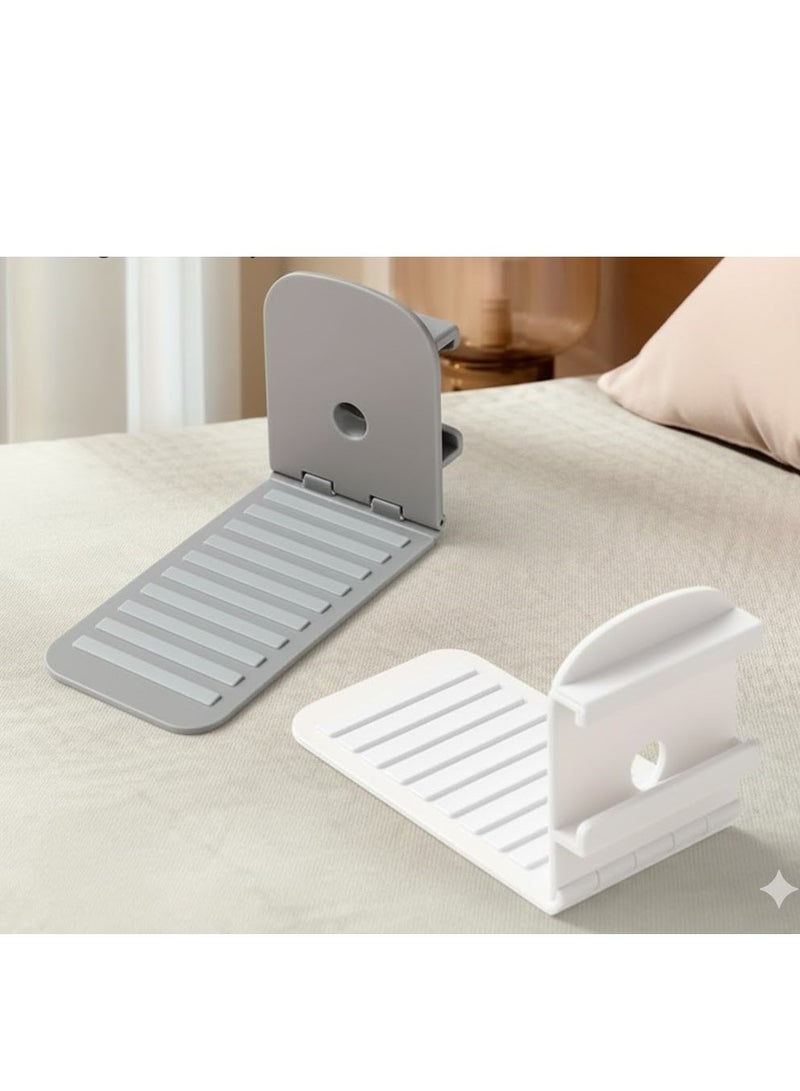 The foldable sheet fastener features a non-slip design to ensure a perfectly snug and organized sheet without having to lift the entire mattress each time. - Image 1