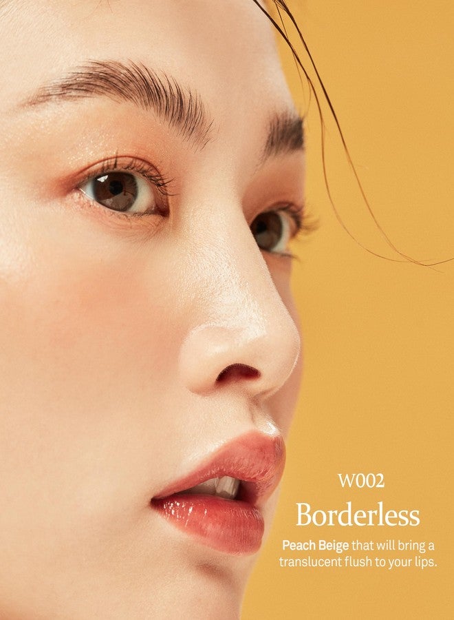 هينس مُحسّن المزاج السائل المتوهج - مُلوّن شفاه غير لزج ومقاوم للماء للنساء - مُلمّع شفاه يدوم طويلاً لإطلالة طبيعية ومتألقة - مكياج سائل مرطب، 0.16 أونصة سائلة (بدون حدود) - Image 2