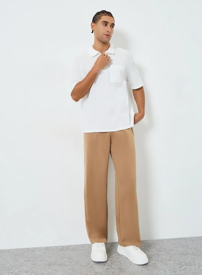 ستايلي بولو واسع محبوك بنمط وافل وسحَّاب غلق