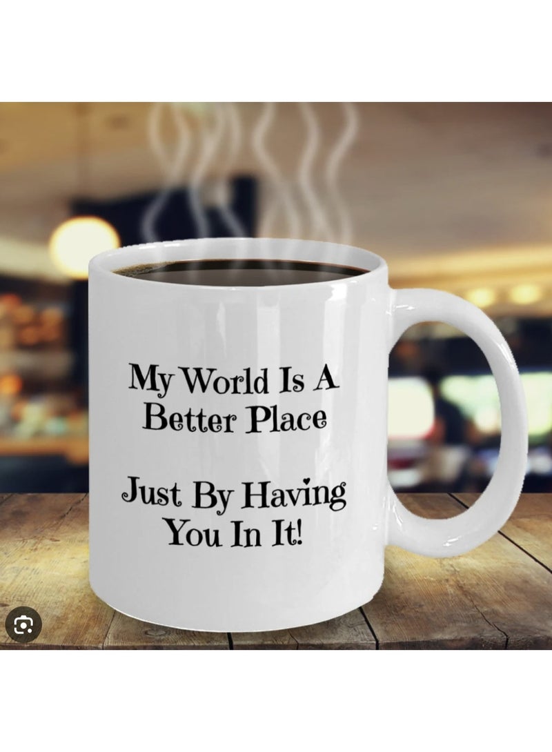 كوب قهوة سيراميك للشاي أو القهوة مطبوع عليه "عالمي أصبح مكانًا أفضل بمجرد وجودك فيه"