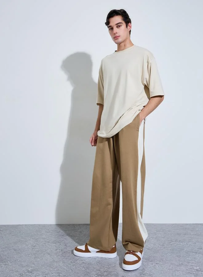 ستايلي Cream Graphic Print Oversized T-Shirt