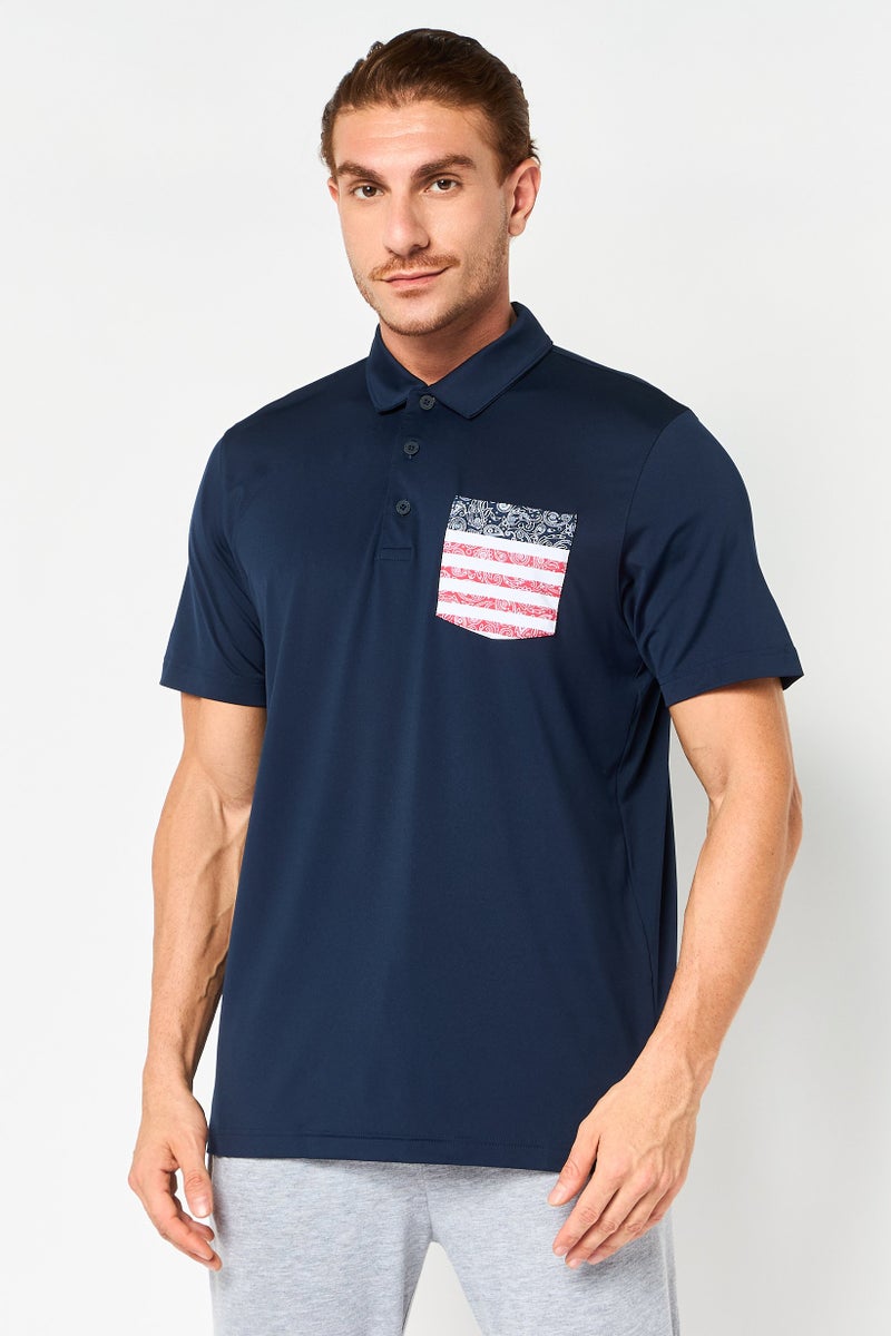 PUMA قميص بولو للتدريب من بومة × فوليشن أمريكا للرجال، رياضي، بشعار العلامة التجارية، لون أزرق داكن - Image 1