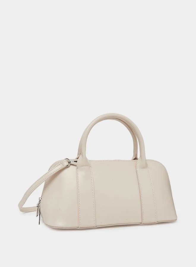 ستايلي شنطة بولينغ كريمية بسحّاب إغلاق