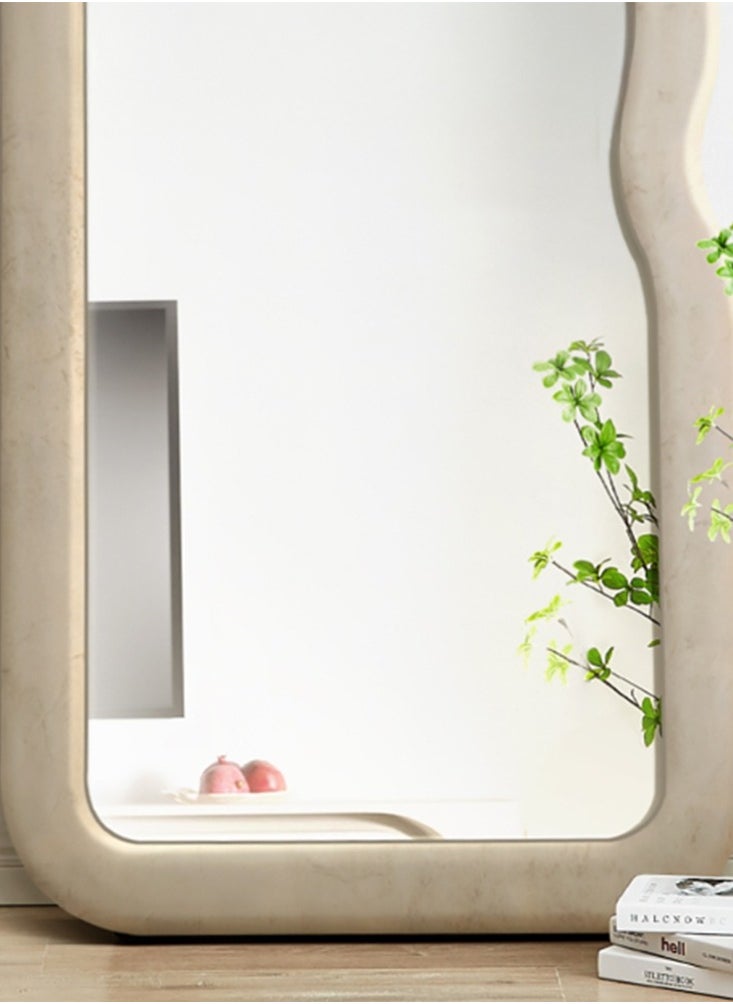 Long mirrors with a luxurious wavy frame