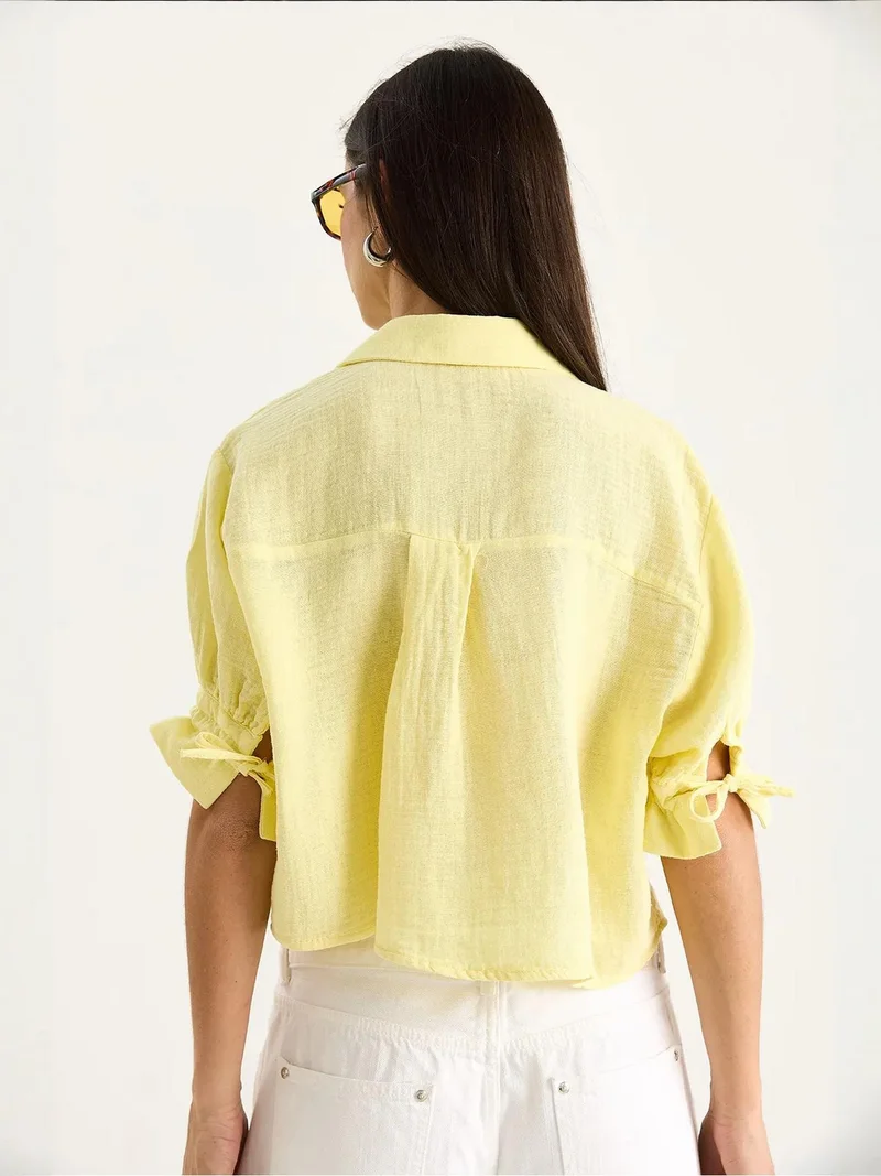 Bianco Lucci LUCCI Cropped Crepe Top with Bow Tie