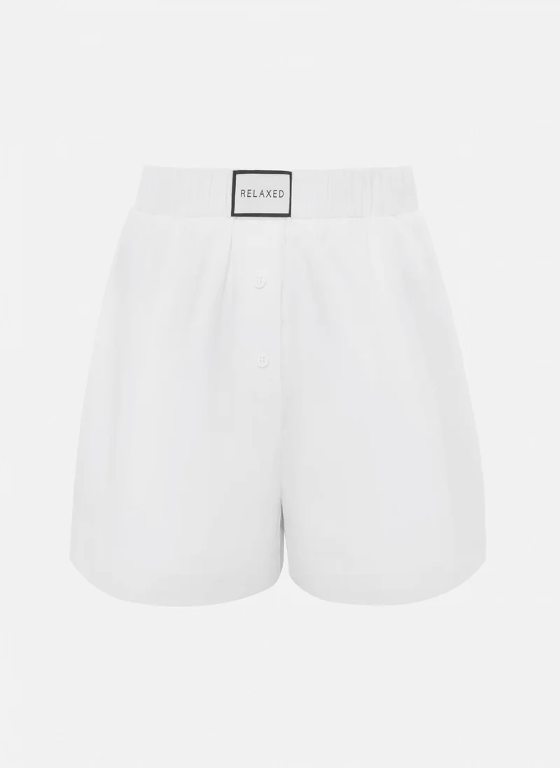 ليتشي شورت بلون موحد بخصر عالي