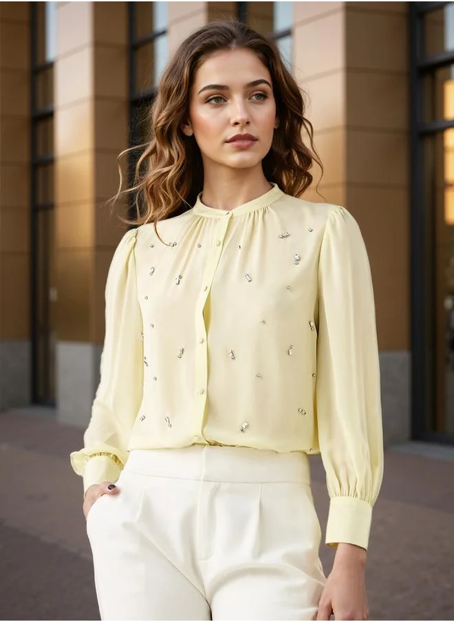 ايكونيك Embellished Top with Puff Sleeves