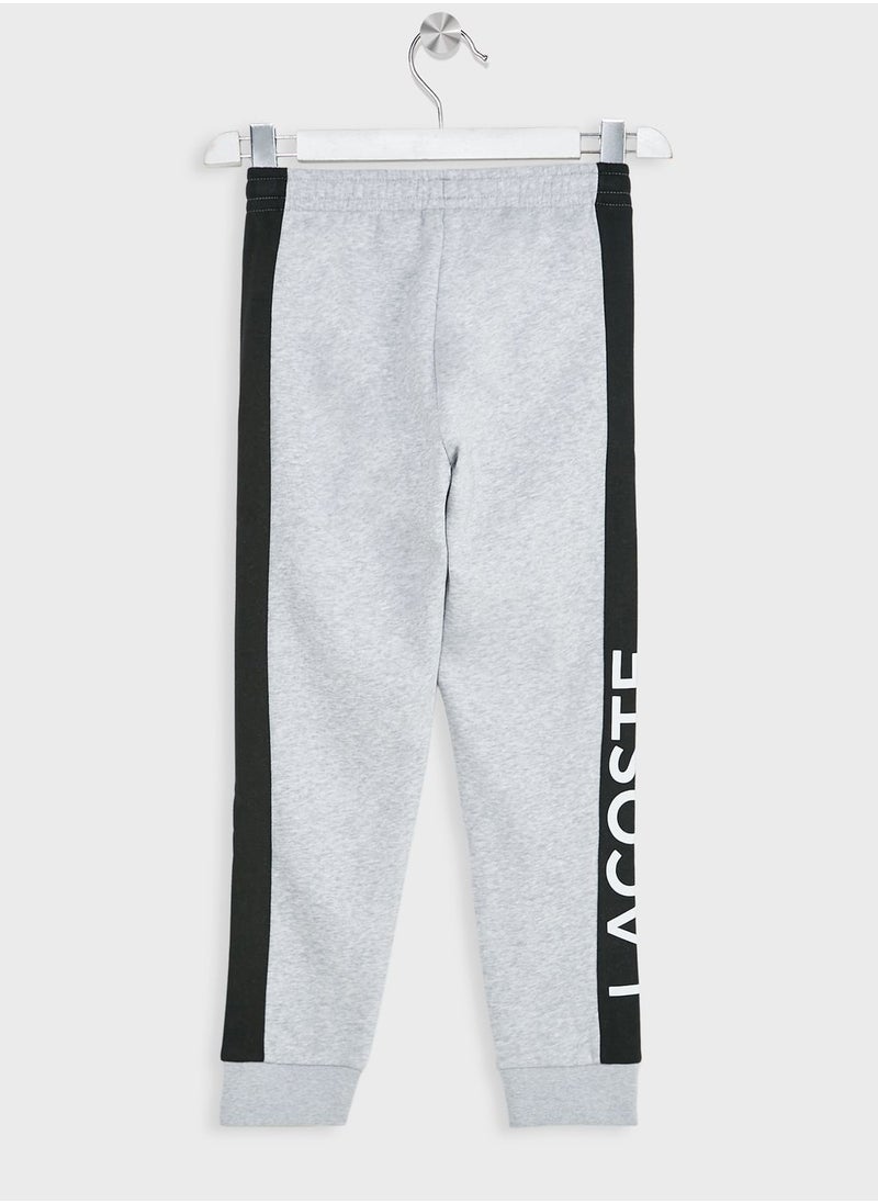 LACOSTE - Kids Logo Stipes Sweatpants - Image 1