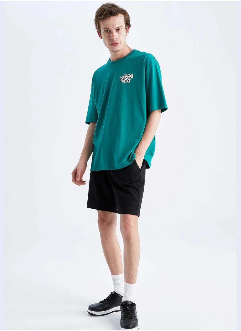 ديفاكتو Man Oversize Fit Crew Neck Short Sleeve T-Shirt