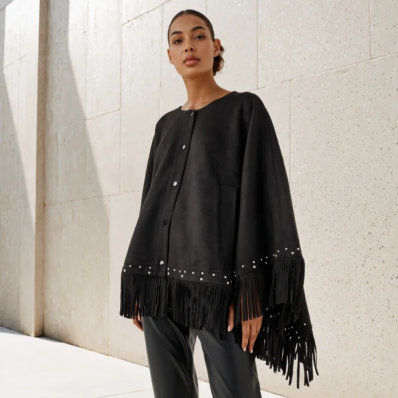 ايكونيك بونشو مزين بشراريب أيقوني